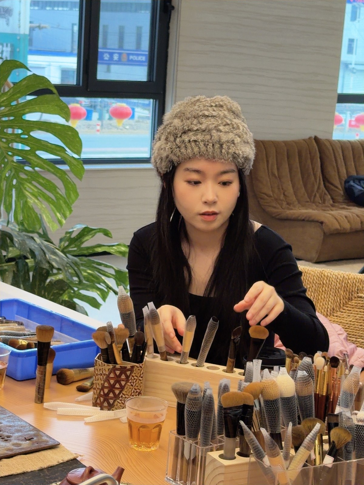 Vivien inspecting brushes